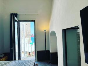 Postel nebo postele na pokoji v ubytování AccalmiA