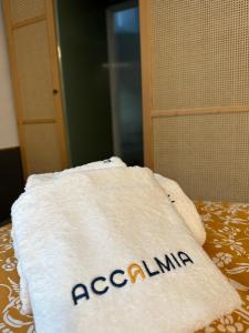 Postel nebo postele na pokoji v ubytování AccalmiA