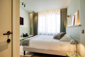 Postel nebo postele na pokoji v ubytování Maison Arya