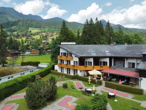an aerial view of a building with a courtyard at Hôtel Les Sources in Les Diablerets