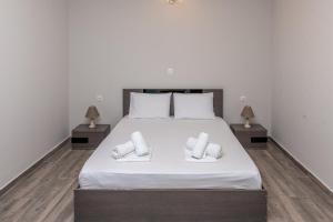 Łóżko lub łóżka w pokoju w obiekcie Medusa Rooms