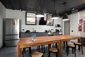 Kuchyň nebo kuchyňský kout v ubytování ANNAMA Coliving