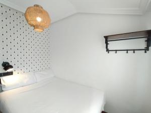Posteľ alebo postele v izbe v ubytovaní Hotel Matilde by gaiarooms