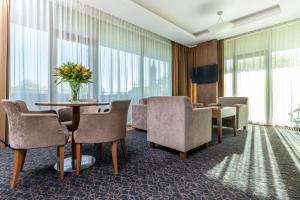 TV a/nebo společenská místnost v ubytování Grand SPA Lietuva Hotel Druskininkai