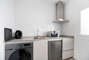 A kitchen or kitchenette at Marqués de Cádiz Suite Jerez Centro