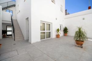 A balcony or terrace at Marqués de Cádiz Suite Jerez Centro