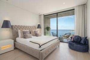 Postel nebo postele na pokoji v ubytování Vila Lazareto by An Island Apart