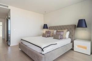 Postel nebo postele na pokoji v ubytování Vila Lazareto by An Island Apart + 59 fotografií