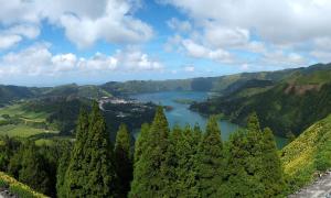 a view of a lake in the mountains at Pousada da Vila in Vila Franca do Campo