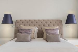 Postel nebo postele na pokoji v ubytování Vila Lazareto by An Island Apart