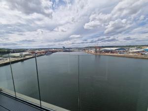 a view of a body of water from a building at Medway Chatham Waters in Gillingham