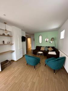 Posezení v ubytování Charmant et chaleureux gîte dans le vignoble + 6 fotografií
