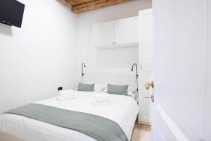 Postel nebo postele na pokoji v ubytování Apartments Allegra