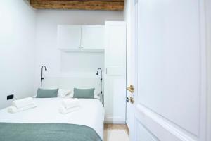 Postel nebo postele na pokoji v ubytování Apartments Allegra