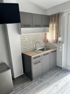 Kuchnia lub aneks kuchenny w obiekcie Medusa Rooms