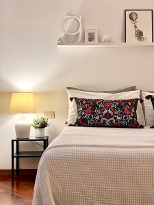 Postel nebo postele na pokoji v ubytování B&B RIO GRANDE