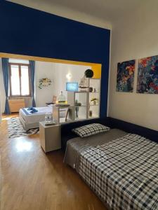 Ένα ή περισσότερα κρεβάτια σε δωμάτιο στο {Porta Venezia - Risorgimento} A/C WiFi