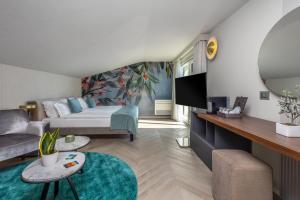 TV a/nebo společenská místnost v ubytování Hotel Val Di Sogno - Adults Only