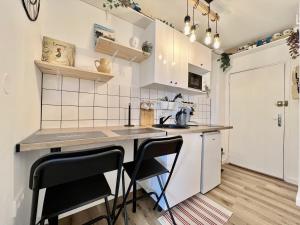 Una cocina o zona de cocina en Le Toucan - Joli studio proche Tram & centre-ville