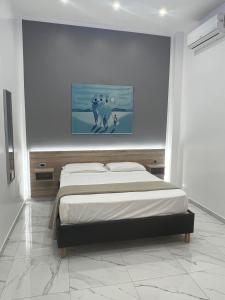 Postel nebo postele na pokoji v ubytování Napoli Forever