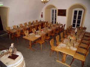 a large room with a long table and chairs at Burg Hohnstein in Hohnstein