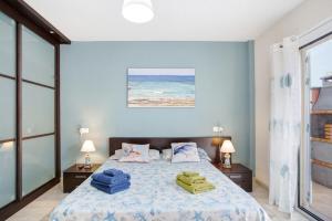 Postel nebo postele na pokoji v ubytování Villa Florencia + 20 fotografií