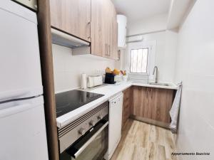 Kuchyň nebo kuchyňský kout v ubytování Sublime sea view apartement