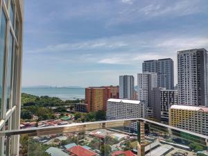 a view of the city from the balcony of a building at Deluxe suites 3, 1BR, 2-5 pax, Netflix, Georgetown in George Town