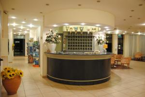 Vstupní hala nebo recepce v ubytování Hotel Capriccio + 33 fotografií