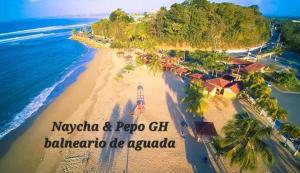 an aerial view of a beach in papua new guinea at Sunset room in Aguada +7 photos