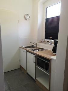 Una cocina o zona de cocina en Havelberg Ferien Apartments HCR