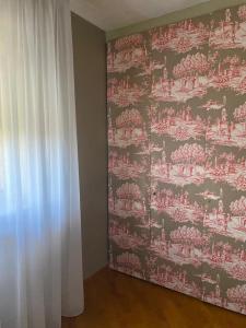 Ein Bett oder Betten in einem Zimmer der Unterkunft Appartamento con veranda Via Castel del Monte