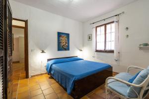 Ένα ή περισσότερα κρεβάτια σε δωμάτιο στο CASA DELL'AMMIRAGLIO