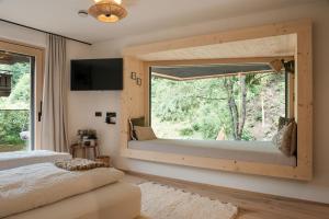 Letto o letti in una camera di Grand Pension Franziska - inkl CrossFit Gym
