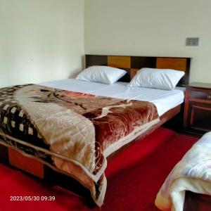 Postel nebo postele na pokoji v ubytování Stream View Guest House