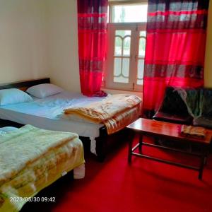 Postel nebo postele na pokoji v ubytování Stream View Guest House