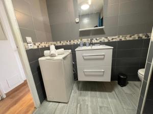 Koupelna v ubytování Appartement face à la mer + 8 fotografií