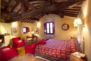 מיטה או מיטות בחדר ב-La Veronica Exclusive Chianti Resort