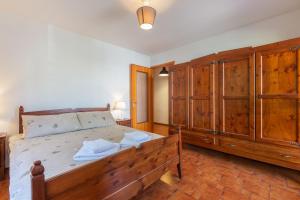 Postel nebo postele na pokoji v ubytování al Timo di Sampeyre