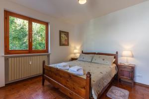 Postel nebo postele na pokoji v ubytování al Timo di Sampeyre