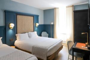 Voodi või voodid majutusasutuse HANNONG Hotel & Wine Bar toas