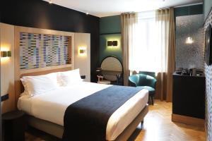 Voodi või voodid majutusasutuse HANNONG Hotel & Wine Bar toas