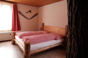 Postel nebo postele na pokoji v ubytování Hotel Tourist