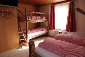Postel nebo postele na pokoji v ubytování Hotel Tourist