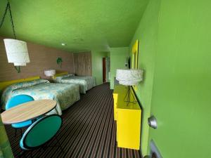 Postel nebo postele na pokoji v ubytování Caribbean Motel
