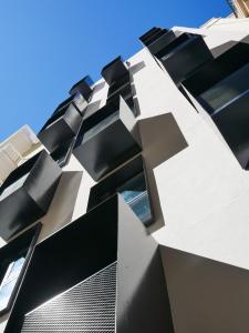 a close up of the side of a building at Eleven by Warren Collection in Sliema