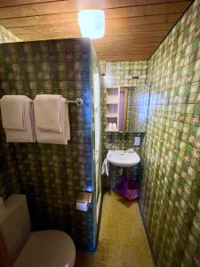 Koupelna v ubytování Hotel Tourist