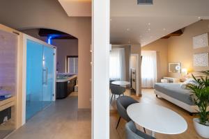 Postel nebo postele na pokoji v ubytování GG8 Hotel & Suite SPA