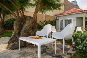 Vonkajšia záhrada v ubytovaní Hermes Beach Front