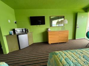 Kuchyň nebo kuchyňský kout v ubytování Caribbean Motel
